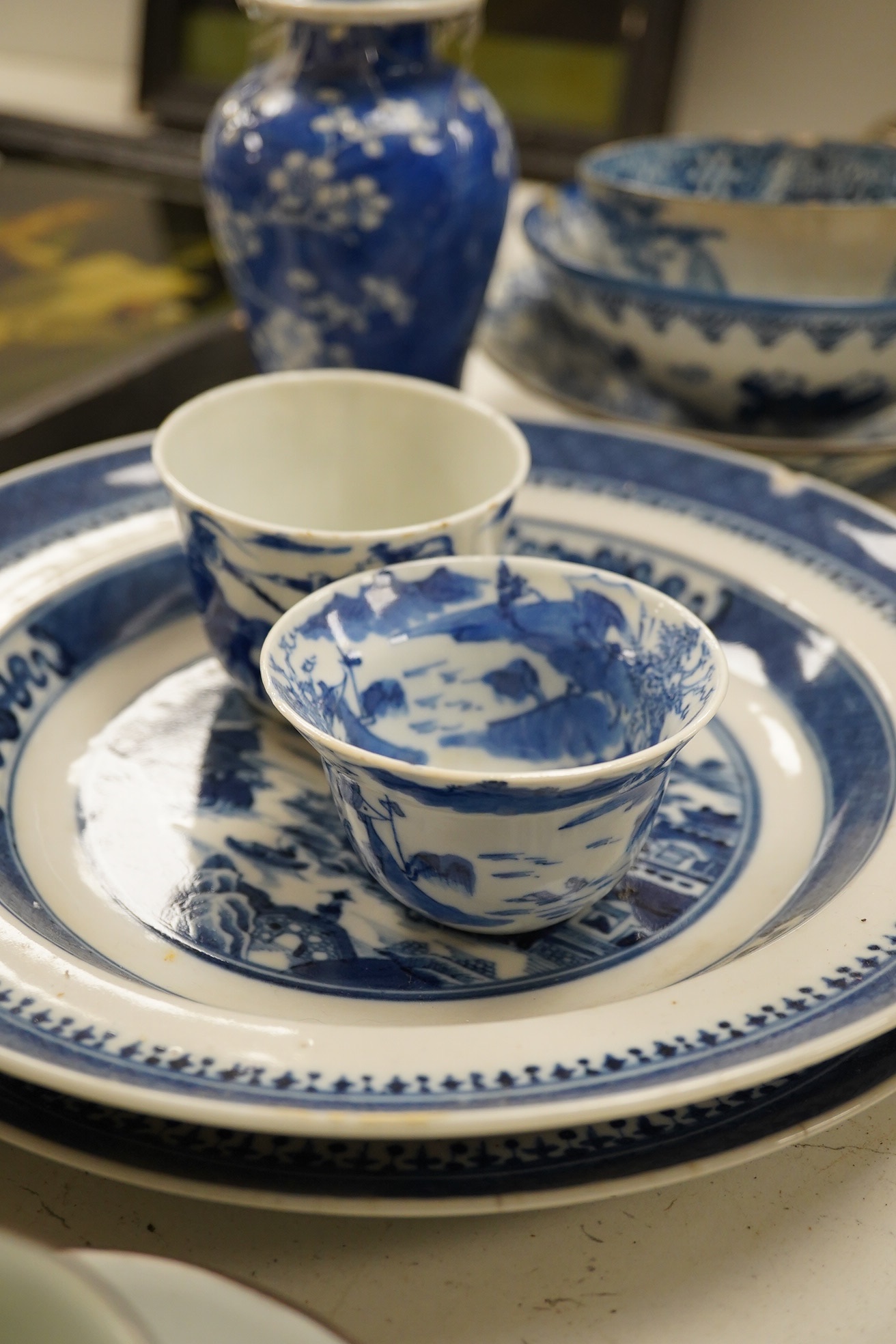 A group of assorted Chinese blue and white tableware. Largest 25cm. Condition - poor to fair